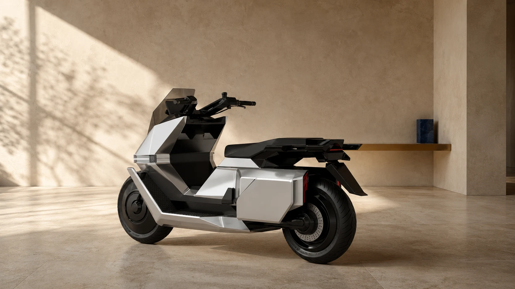 A sculptural electric motorcycle in a sunlit product gallery